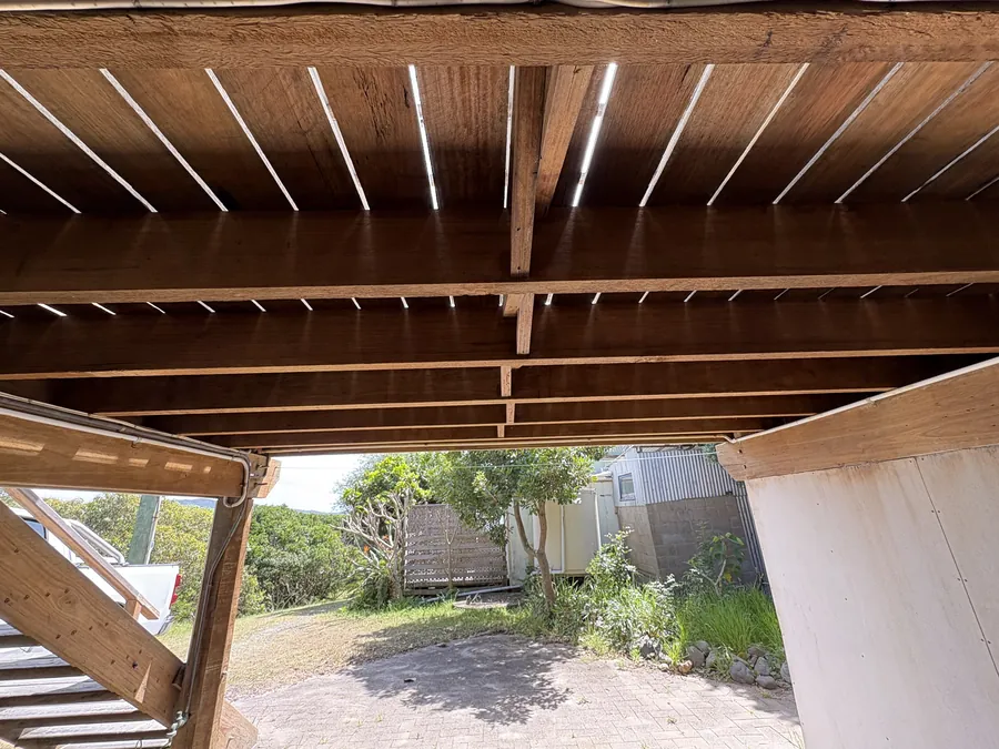Timber pergola lining looking out to a garden